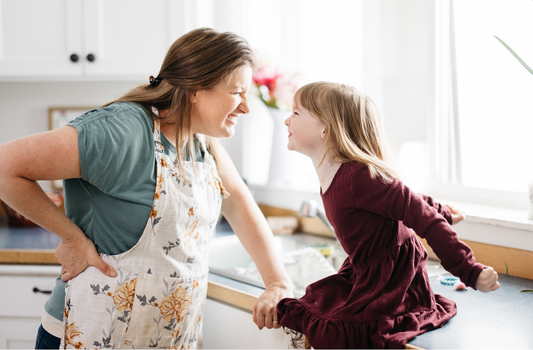 mother and daughter in kitchen, bend soap company