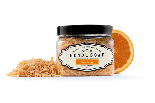 Goat Milk Bath Sweet Orange Shreds Packaged in a Container