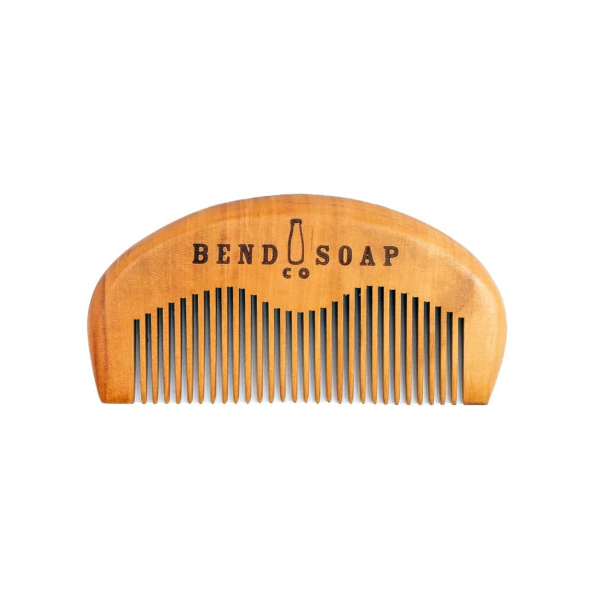 The Beard Comb features fine wooden teeth and "BEND SOAP CO" engraving, shown on a white background. Ideal to use with your favorite Beard Salve.