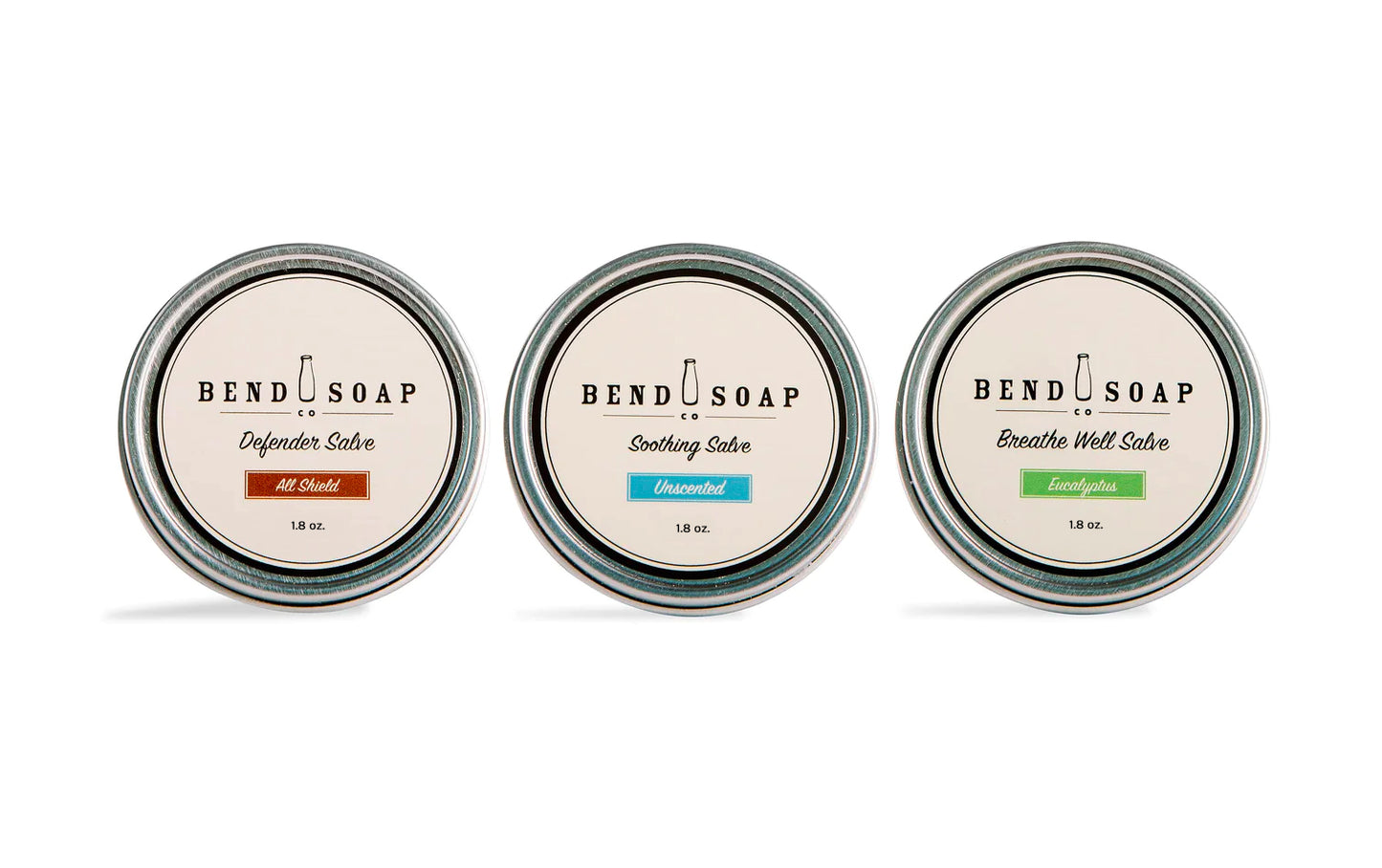A variety pack of all-natural salves on a white background