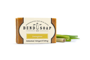 Full Size Bar of Lemongrass Goat Milk Soap With Fresh Stalks of Lemongrass