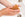 Woman washing her hands with a bar of all shield goat milk soap