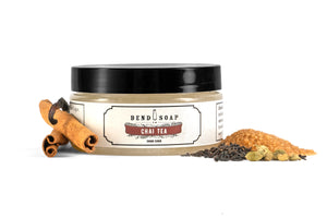 Chai Tea Sugar Body Scrub with fresh chai tea ingredients on white background