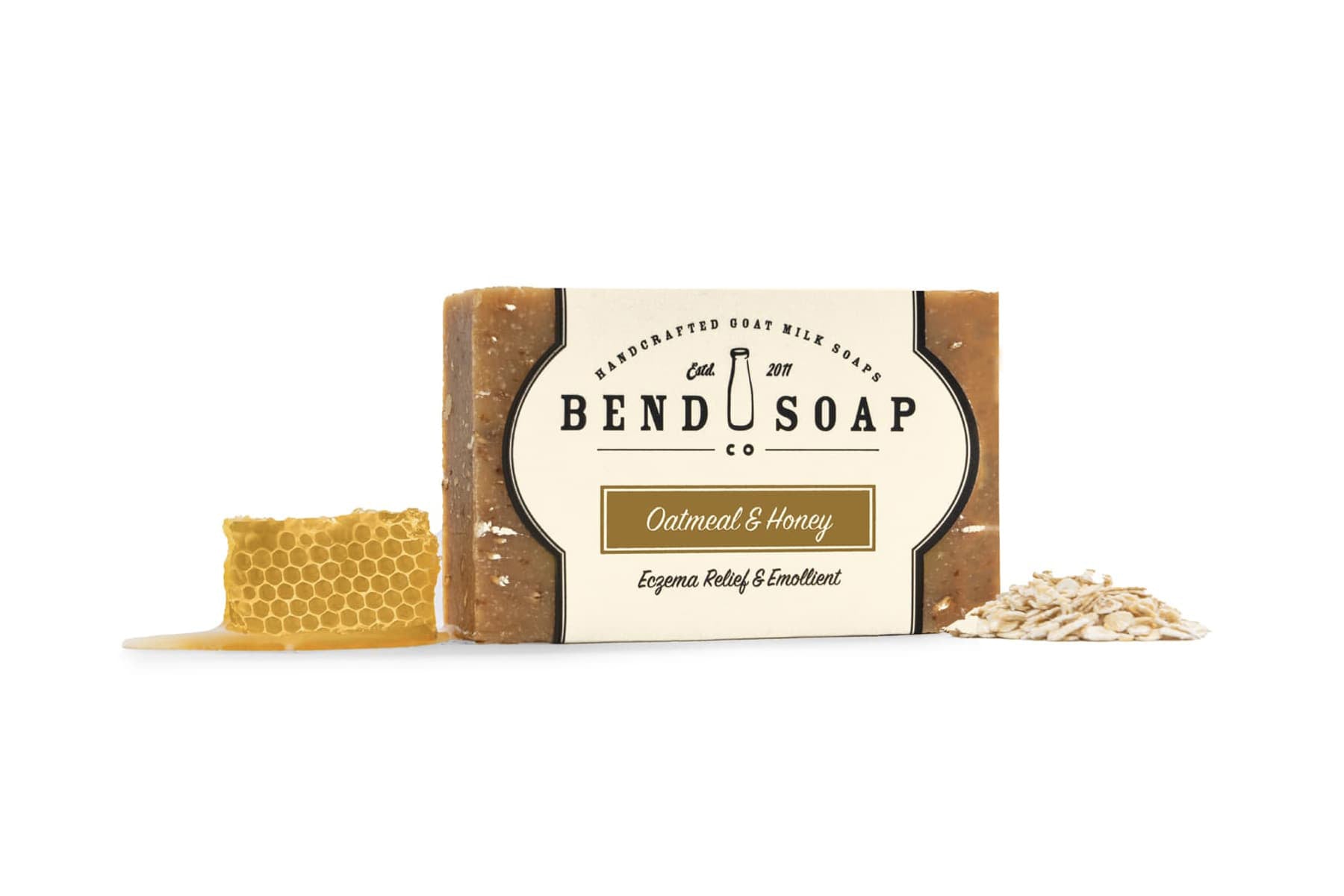 Oatmeal and Honey Goat Milk Soap with Fresh Honey and a Stack of Oats